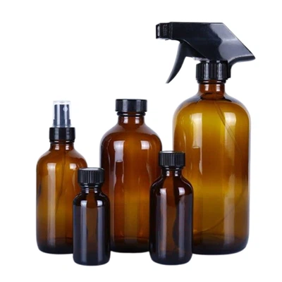 Botol kaca kuning dengan penyemprot pemicu